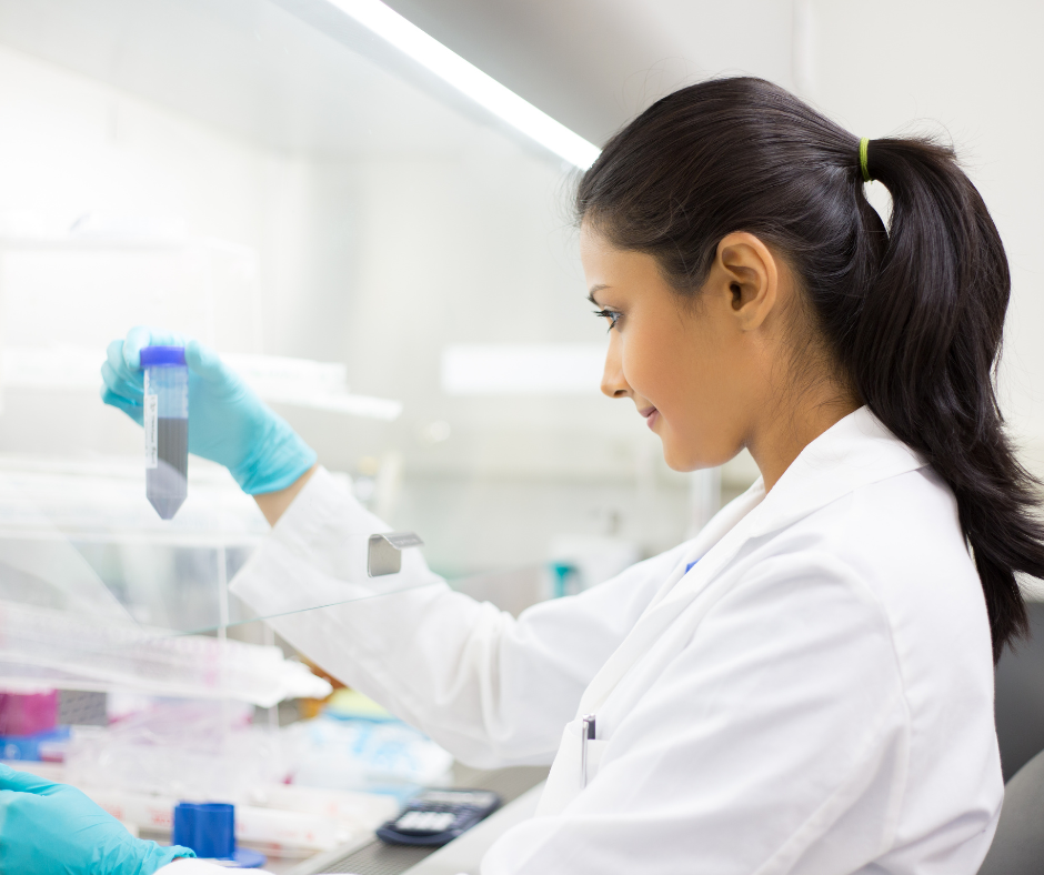 Laboratory technician performing CBD regulatory compliance and analytical testing on a botanical specimen in a controlled laboratory environment.